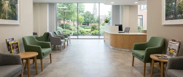 Bright healthcare waiting room with safety vinyl flooring