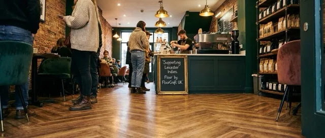 Independent café in Leicester with herringbone wood-effect flooring