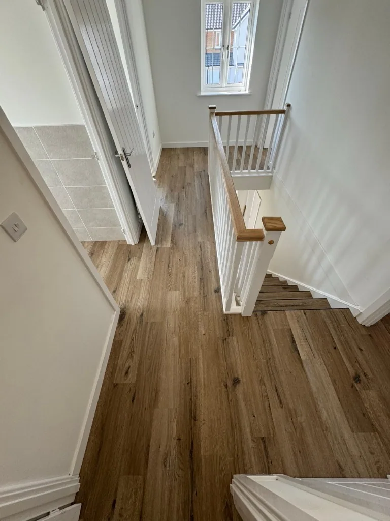 Landing and hallway wood-effect LVT at Mill Rise, Quorn